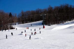 people skiing down ski slopes