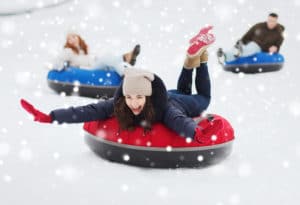 tubers on ski trails