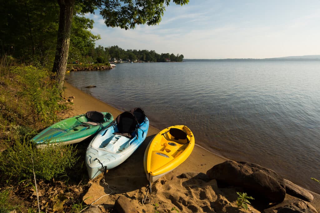 New Hampshire Bed and Breakfast, photo of colorful kayaks on the lake 